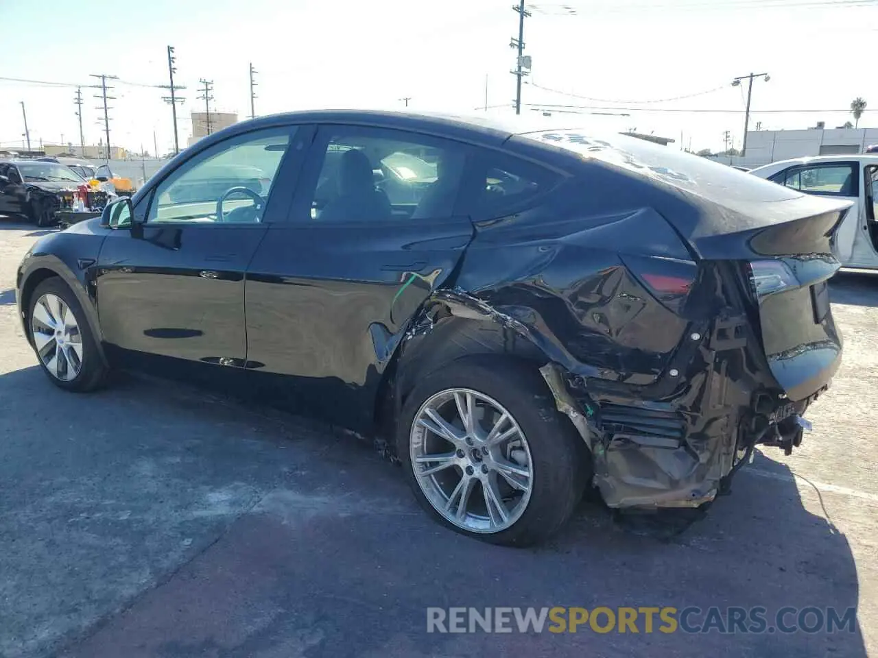 2 fotografías del automóvil dañado 7SAYGDEE9PF608303 TESLA MODEL Y 2023