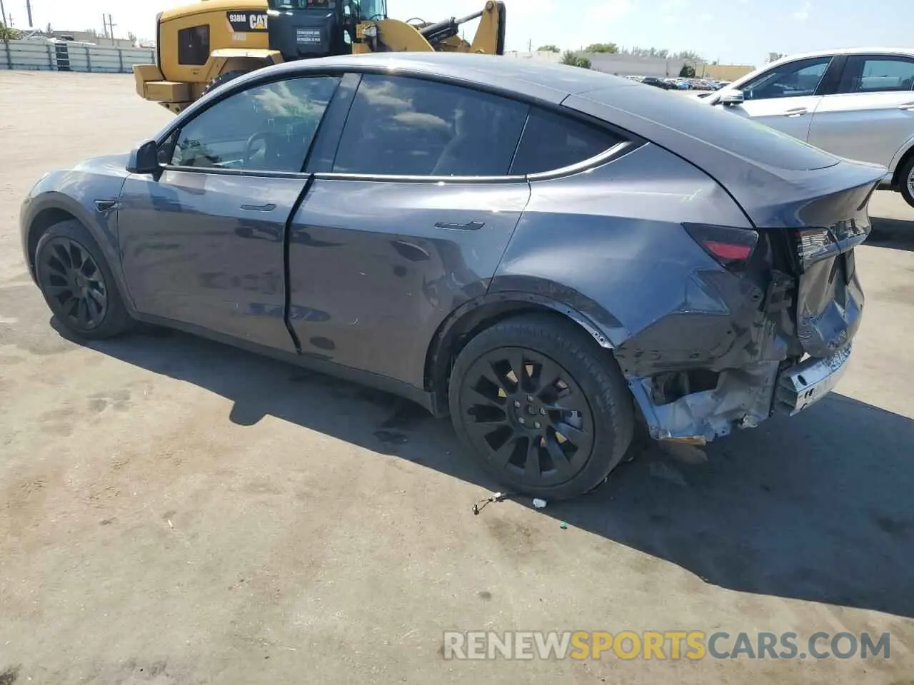 2 fotografías del automóvil dañado 7SAYGDEE9PF748268 TESLA MODEL Y 2023