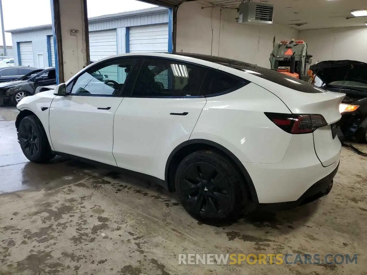 2 fotografías del automóvil dañado 7SAYGDEE9PF805214 TESLA MODEL Y 2023