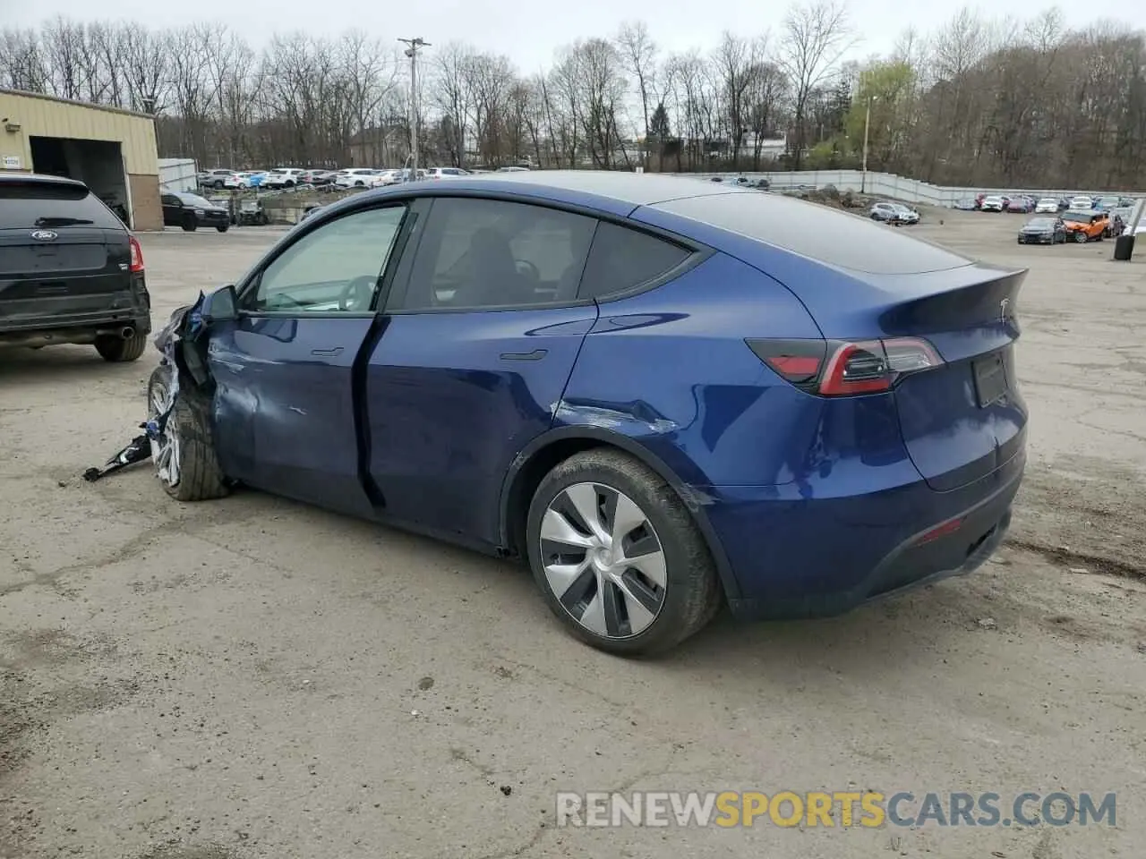 2 fotografías del automóvil dañado 7SAYGDEE9PF810591 TESLA MODEL Y 2023