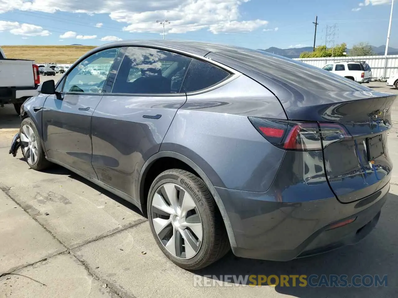 2 fotografías del automóvil dañado 7SAYGDEE9PF838911 TESLA MODEL Y 2023