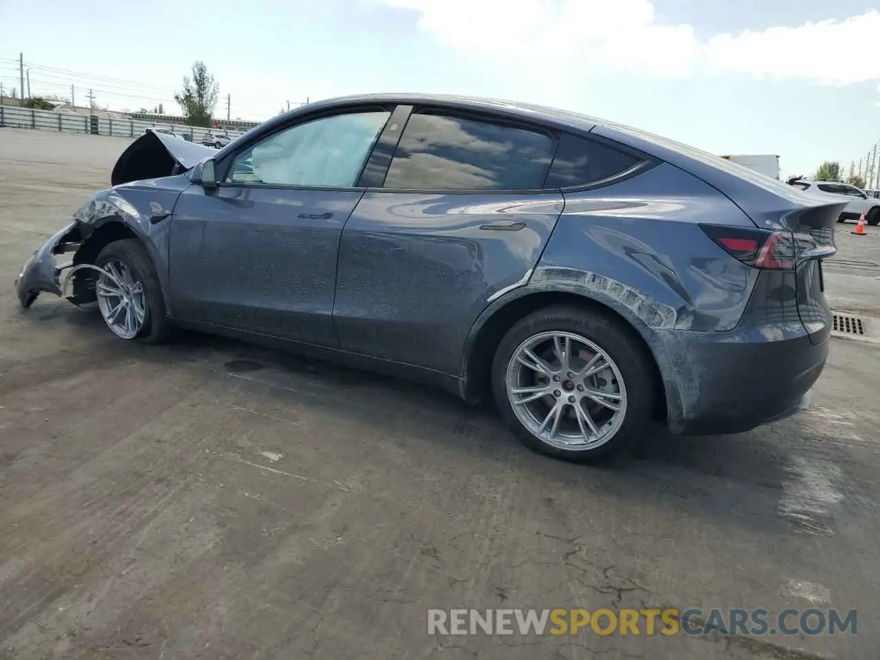 2 fotografías del automóvil dañado 7SAYGDEE9PF885405 TESLA MODEL Y 2023