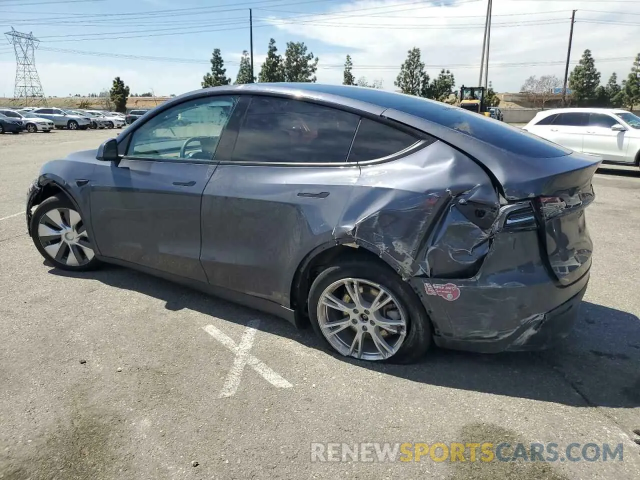 2 fotografías del automóvil dañado 7SAYGDEEXPA157332 TESLA MODEL Y 2023