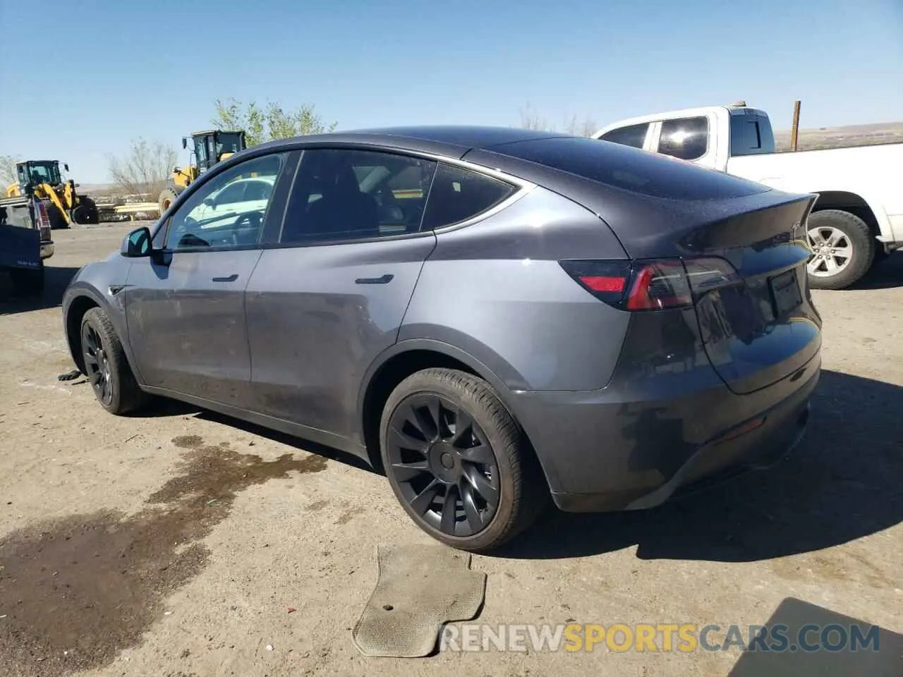 2 fotografías del automóvil dañado 7SAYGDEEXPF754676 TESLA MODEL Y 2023