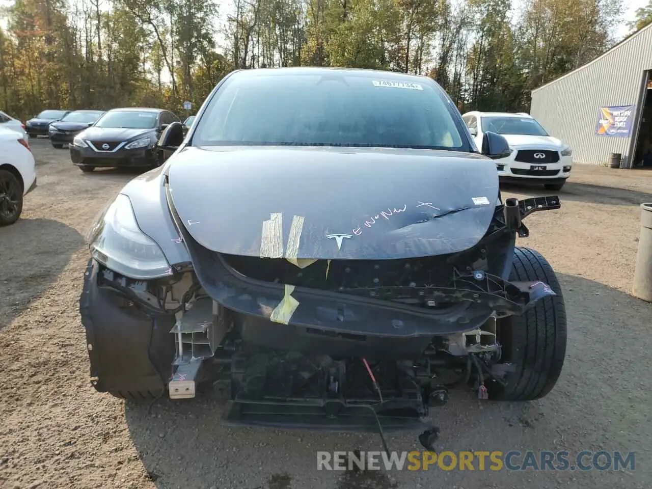 5 fotografías del automóvil dañado 7SAYGDEEXPF774071 TESLA MODEL Y 2023