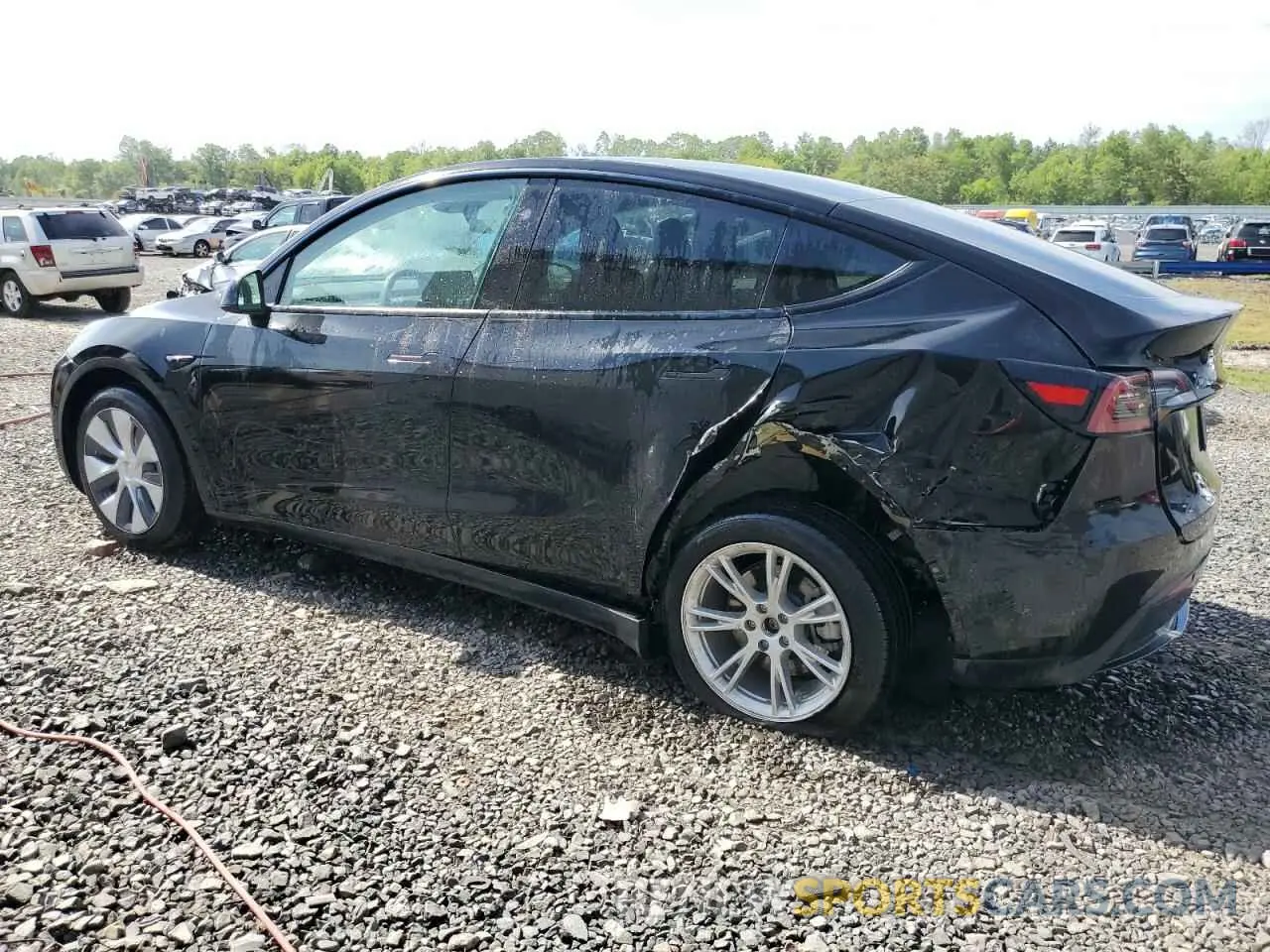 2 fotografías del automóvil dañado 7SAYGDEEXPF827903 TESLA MODEL Y 2023