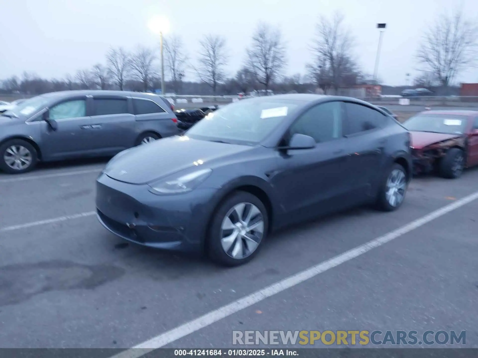 2 fotografías del automóvil dañado 7SAYGDEEXPF865549 TESLA MODEL Y 2023