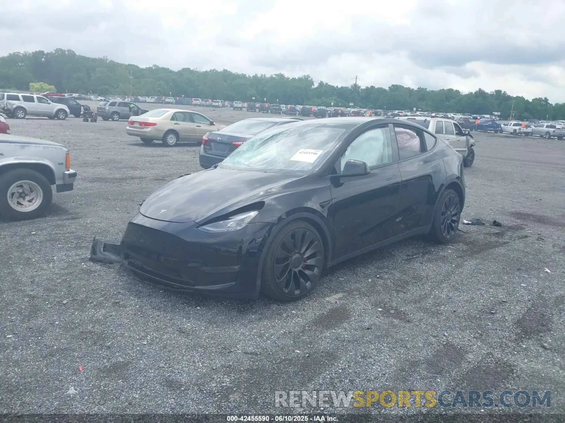 2 fotografías del automóvil dañado 7SAYGDEF1PF940941 TESLA MODEL Y 2023