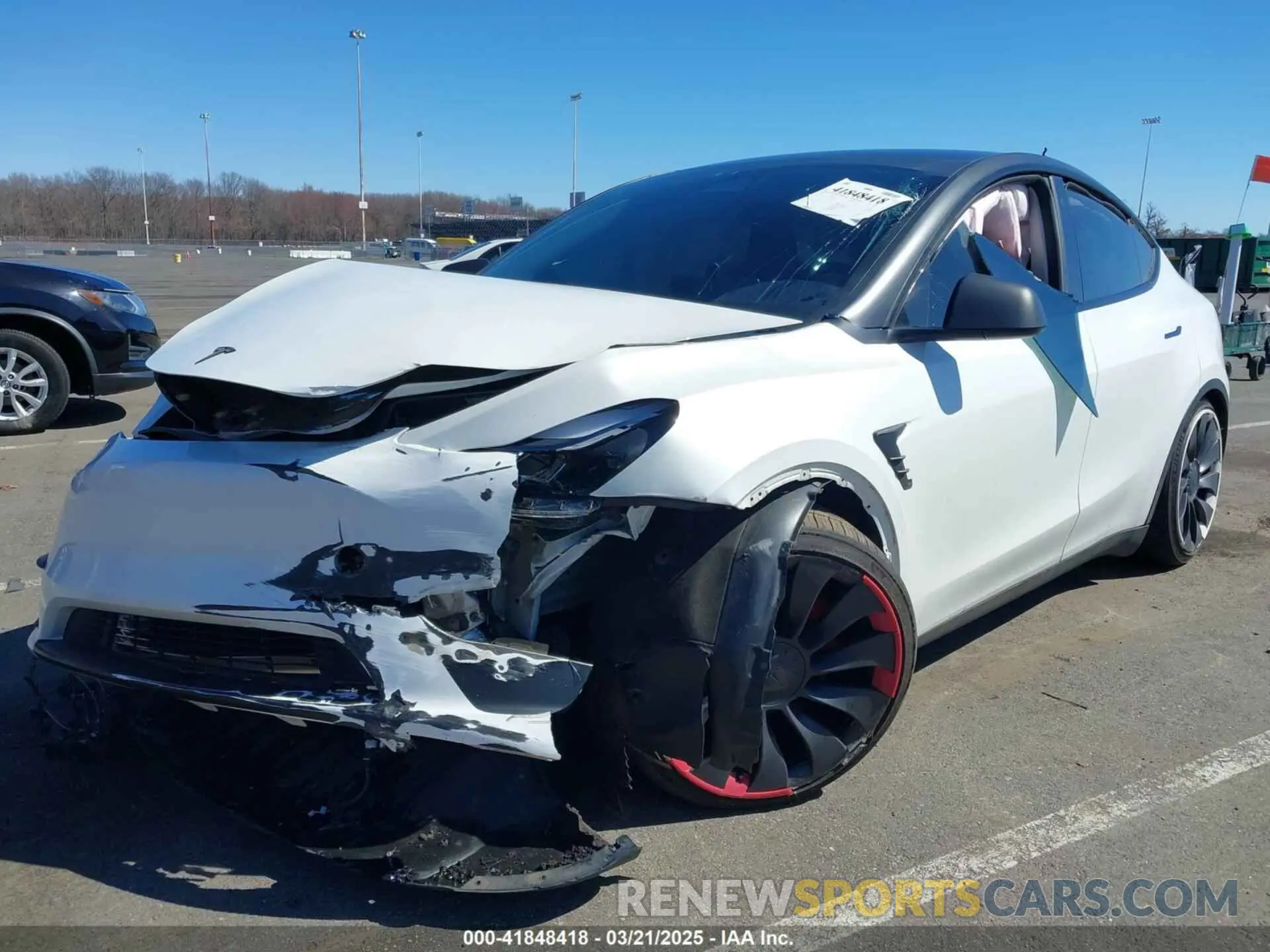 2 fotografías del automóvil dañado 7SAYGDEF2PF775367 TESLA MODEL Y 2023