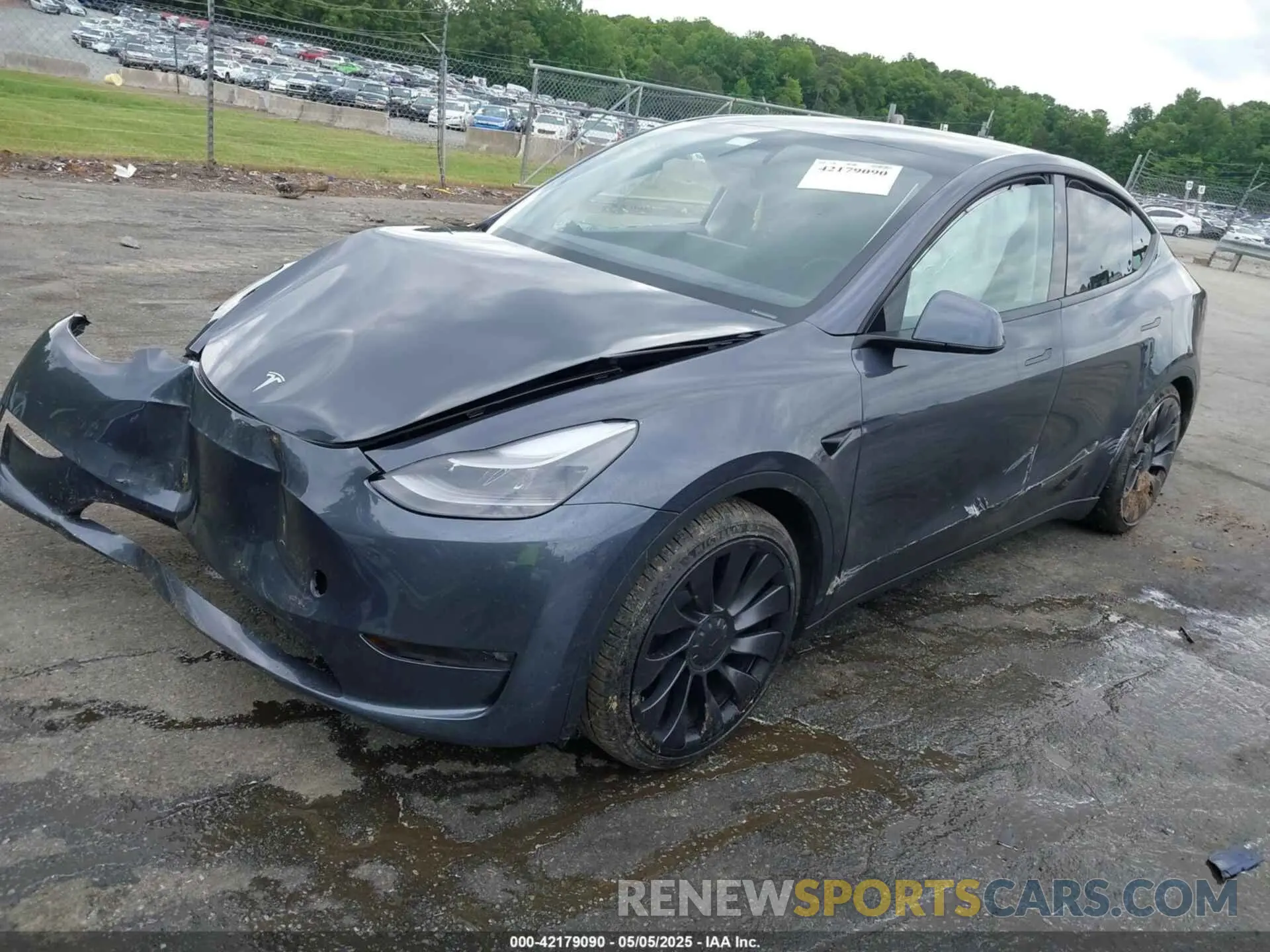 2 fotografías del automóvil dañado 7SAYGDEF2PF845353 TESLA MODEL Y 2023