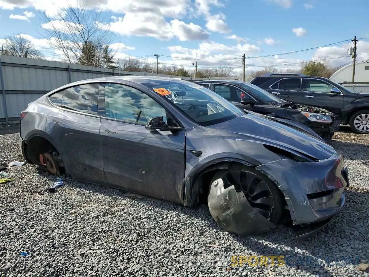 4 fotografías del automóvil dañado 7SAYGDEF4PF841336 TESLA MODEL Y 2023