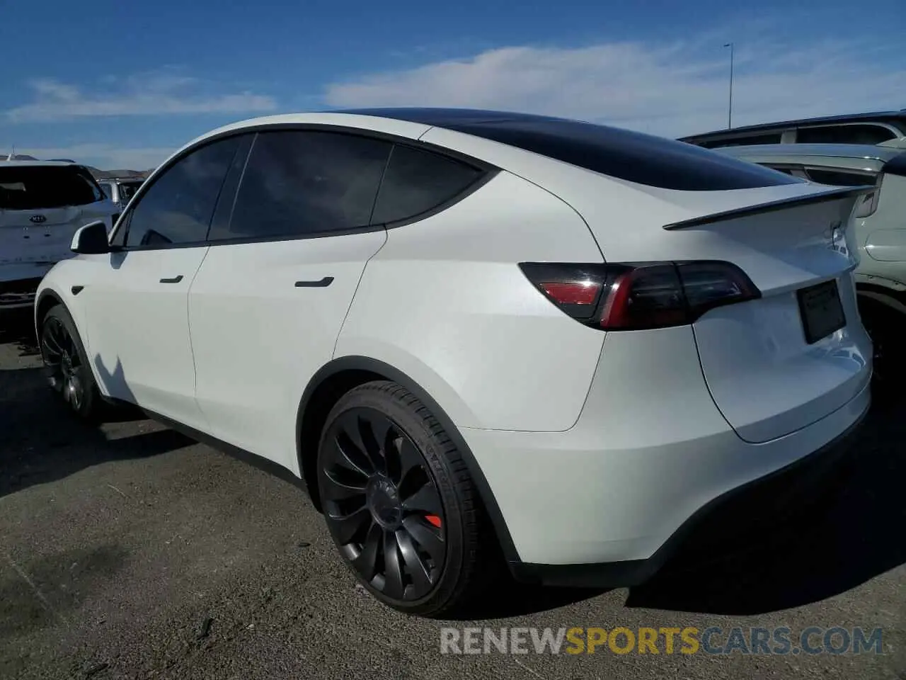 2 fotografías del automóvil dañado 7SAYGDEF4PF871940 TESLA MODEL Y 2023