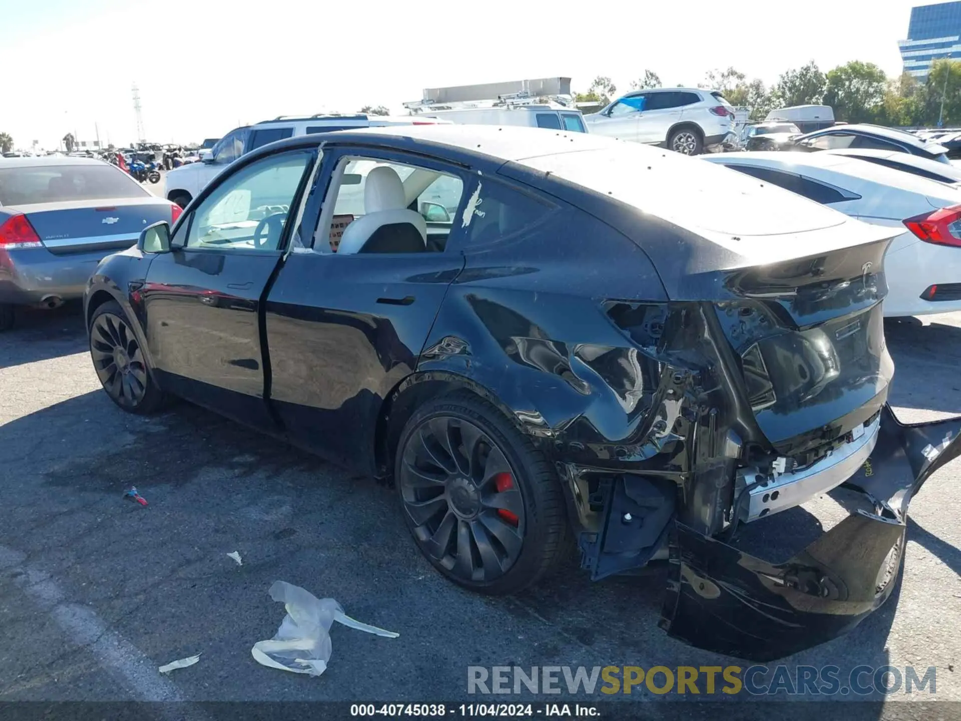 2 fotografías del automóvil dañado 7SAYGDEF5PF663940 TESLA MODEL Y 2023