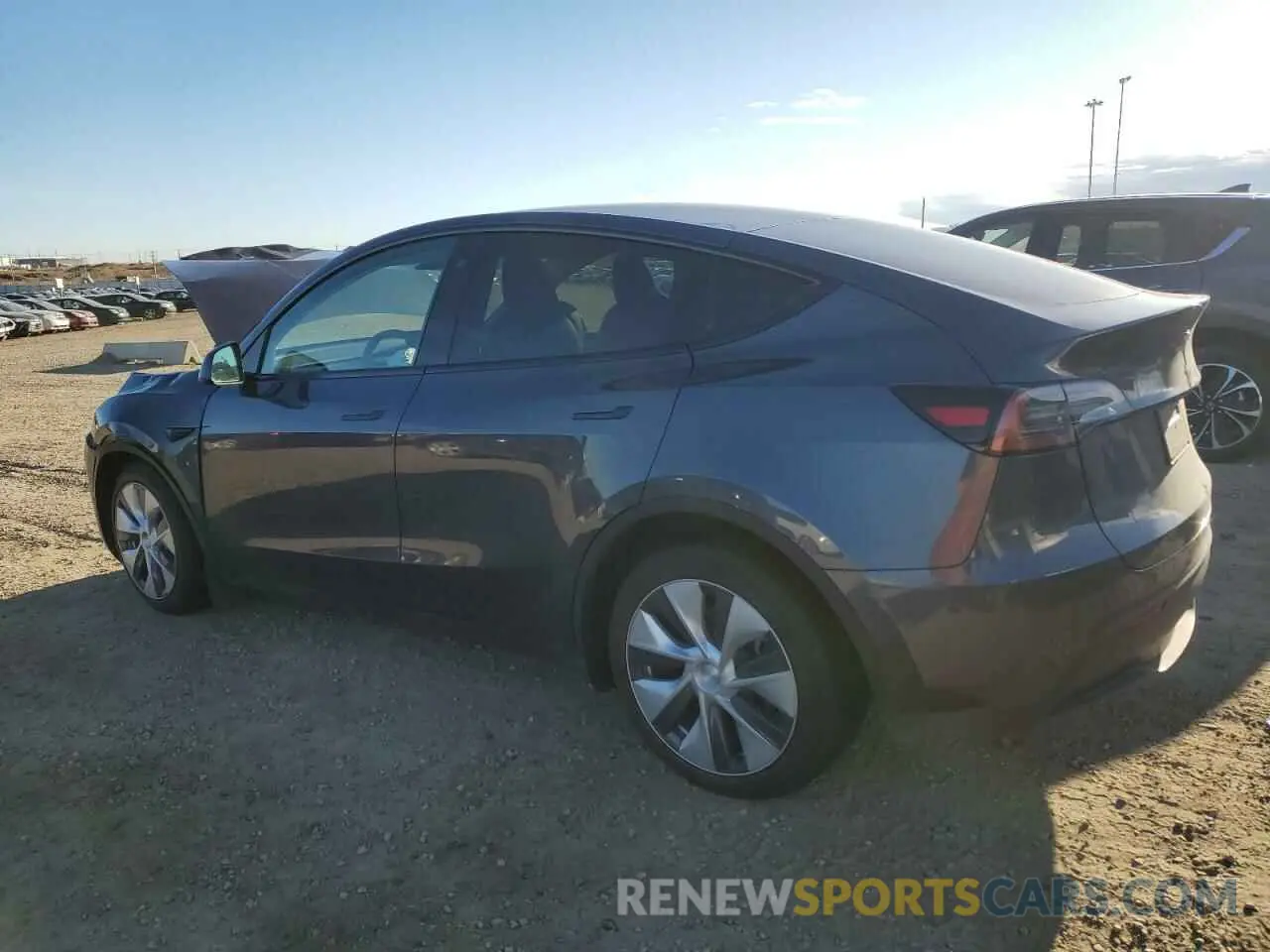 2 fotografías del automóvil dañado LRWYGDEE9PC265872 TESLA MODEL Y 2023