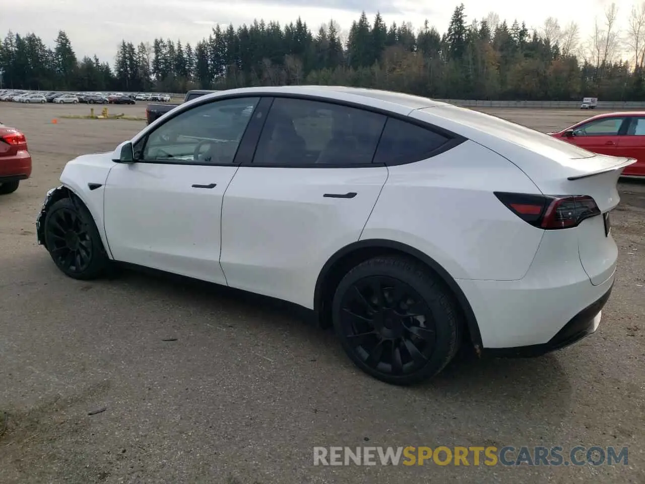 2 fotografías del automóvil dañado 7SAYGAEE1RF190241 TESLA MODEL Y 2024