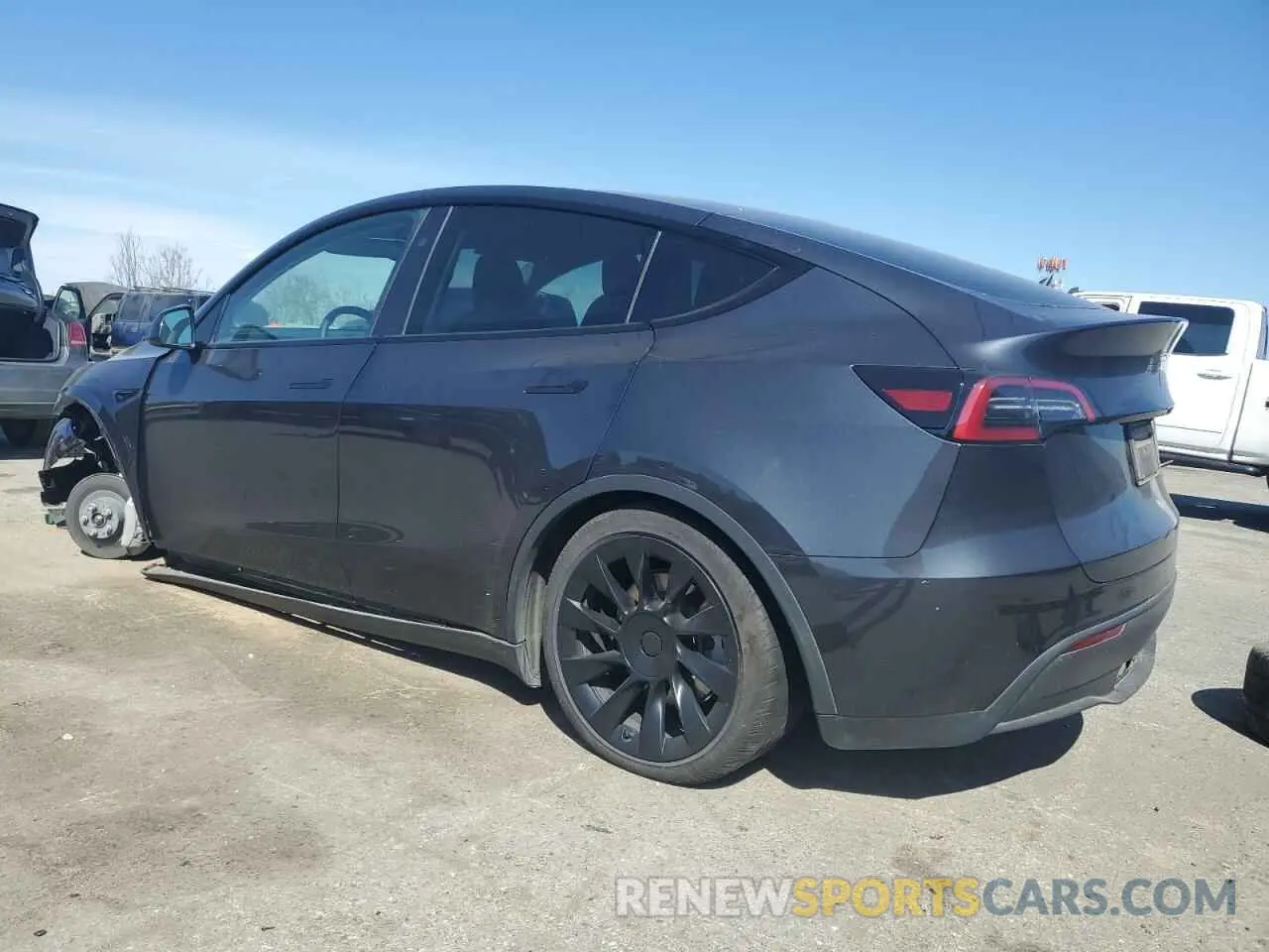 2 fotografías del automóvil dañado 7SAYGAEE1RF988643 TESLA MODEL Y 2024