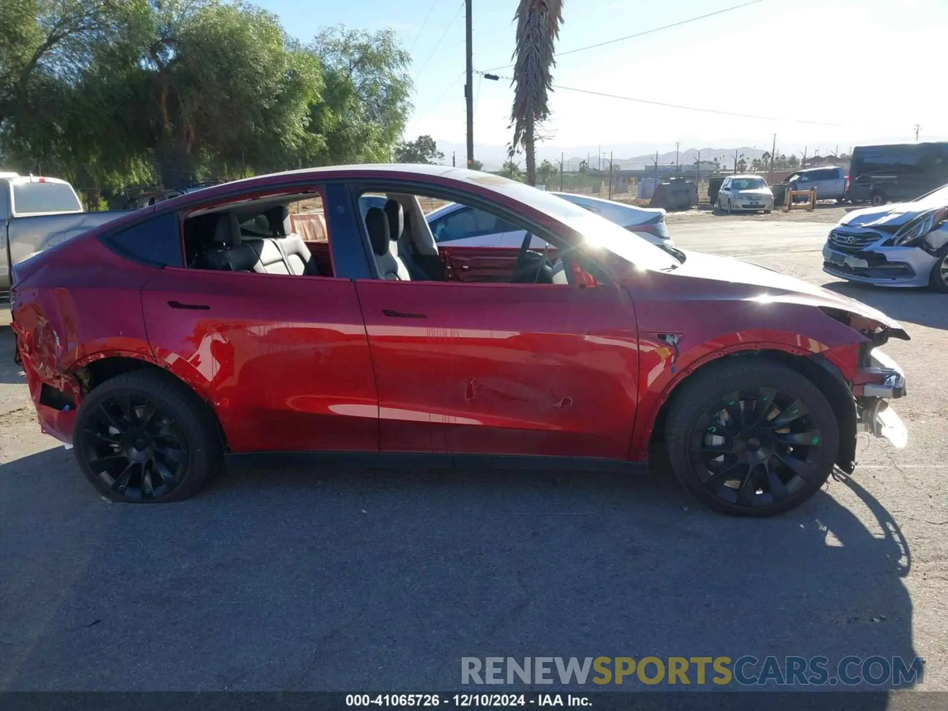 14 fotografías del automóvil dañado 7SAYGAEE2RF021118 TESLA MODEL Y 2024
