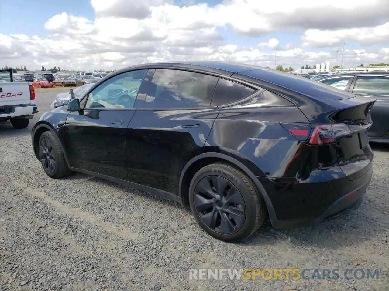 2 fotografías del automóvil dañado 7SAYGAEE6RF127846 TESLA MODEL Y 2024