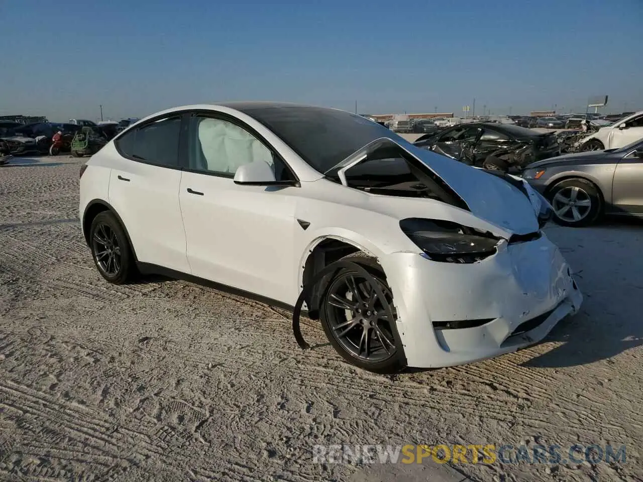 4 fotografías del automóvil dañado 7SAYGAEE6RF153248 TESLA MODEL Y 2024