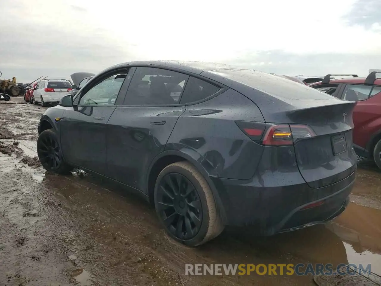 2 fotografías del automóvil dañado 7SAYGAEE7RF043096 TESLA MODEL Y 2024