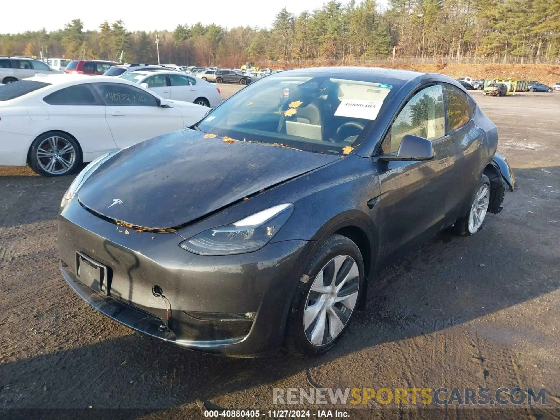 2 fotografías del automóvil dañado 7SAYGAEE8RF063471 TESLA MODEL Y 2024