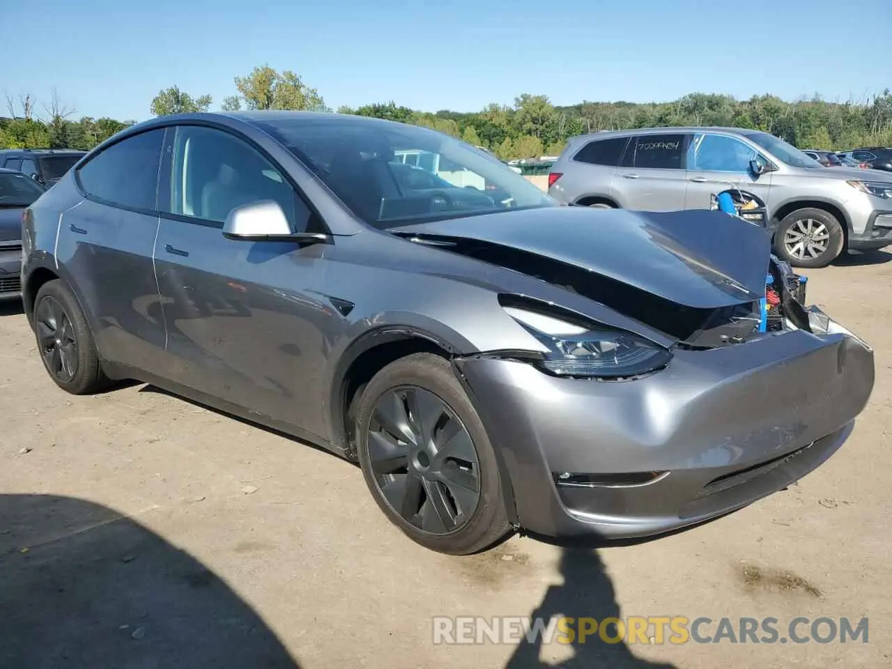 4 fotografías del automóvil dañado 7SAYGAEE9RF109602 TESLA MODEL Y 2024
