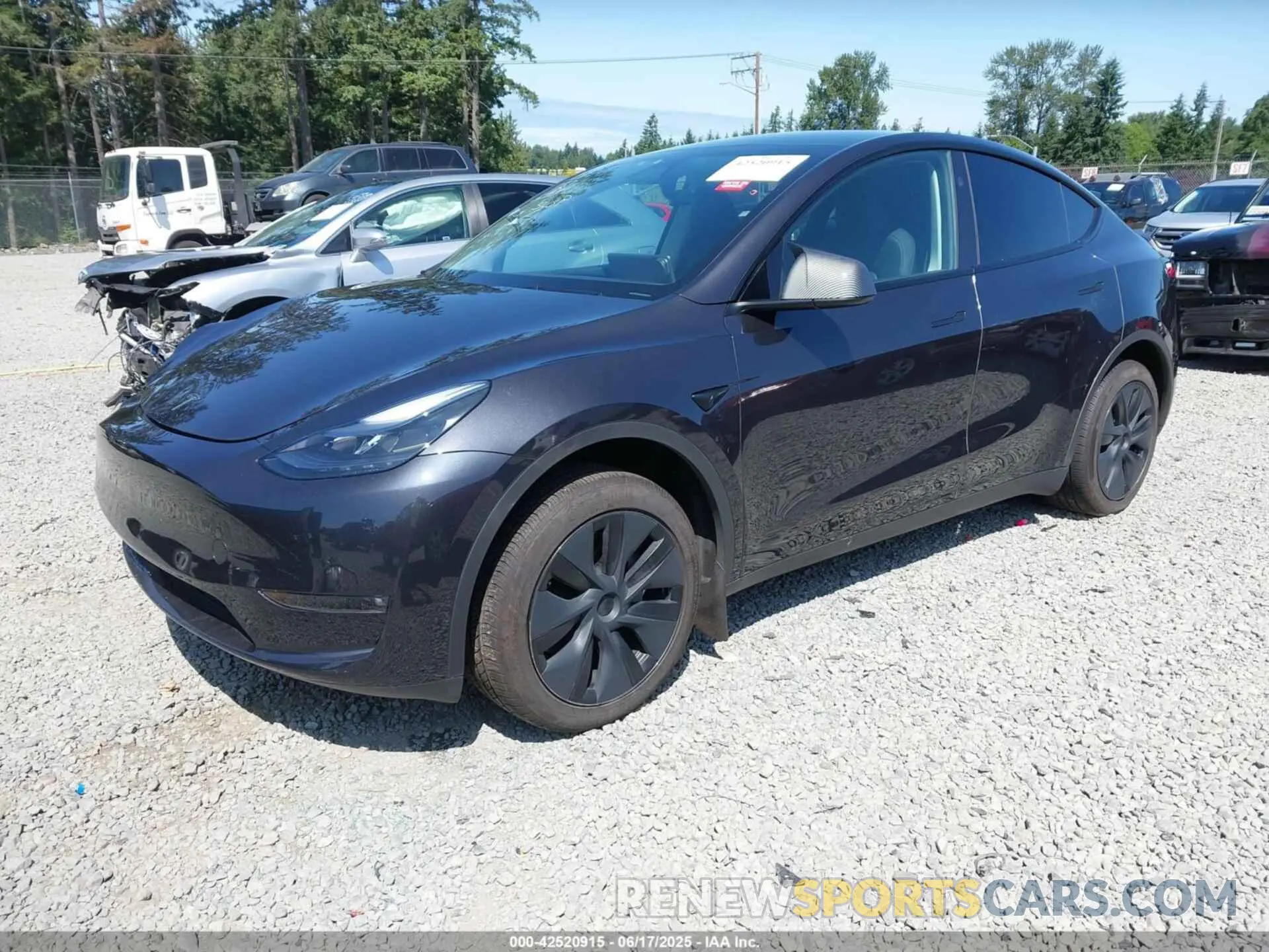 2 fotografías del automóvil dañado 7SAYGAEEXRF180212 TESLA MODEL Y 2024