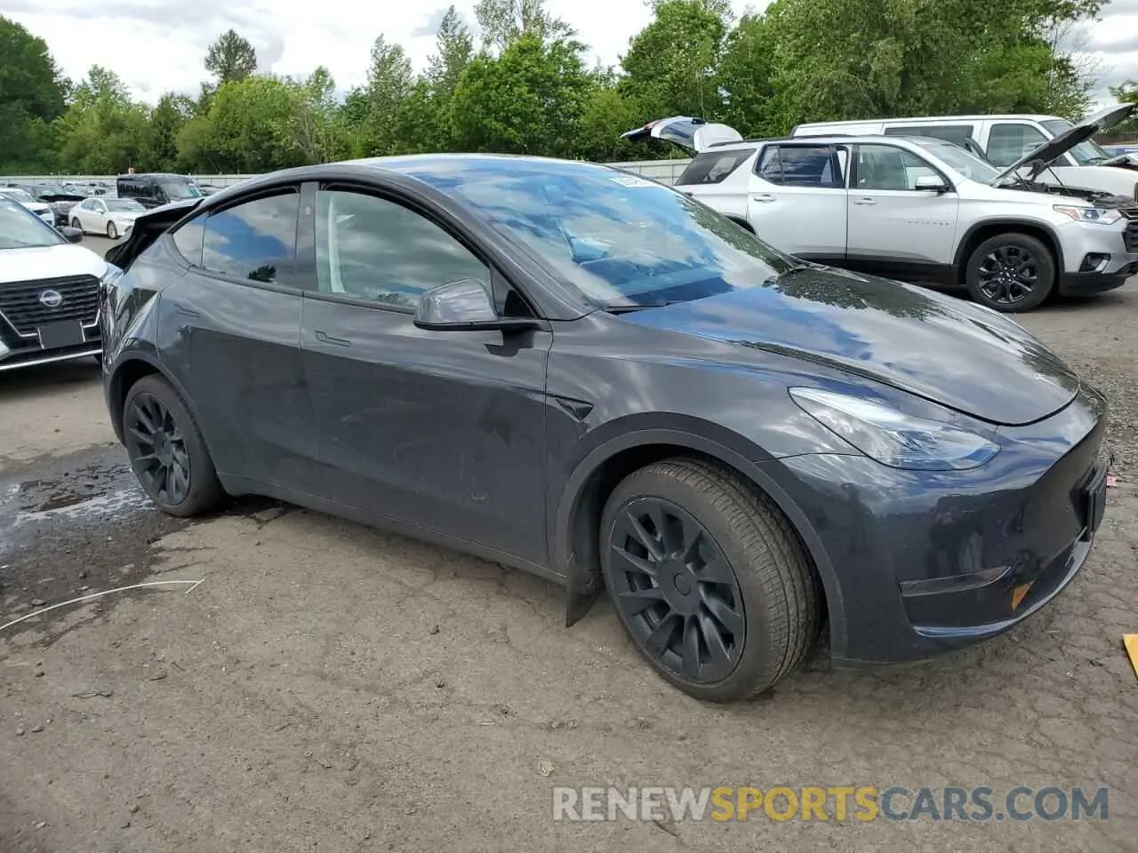 4 fotografías del automóvil dañado 7SAYGDED0RF043675 TESLA MODEL Y 2024