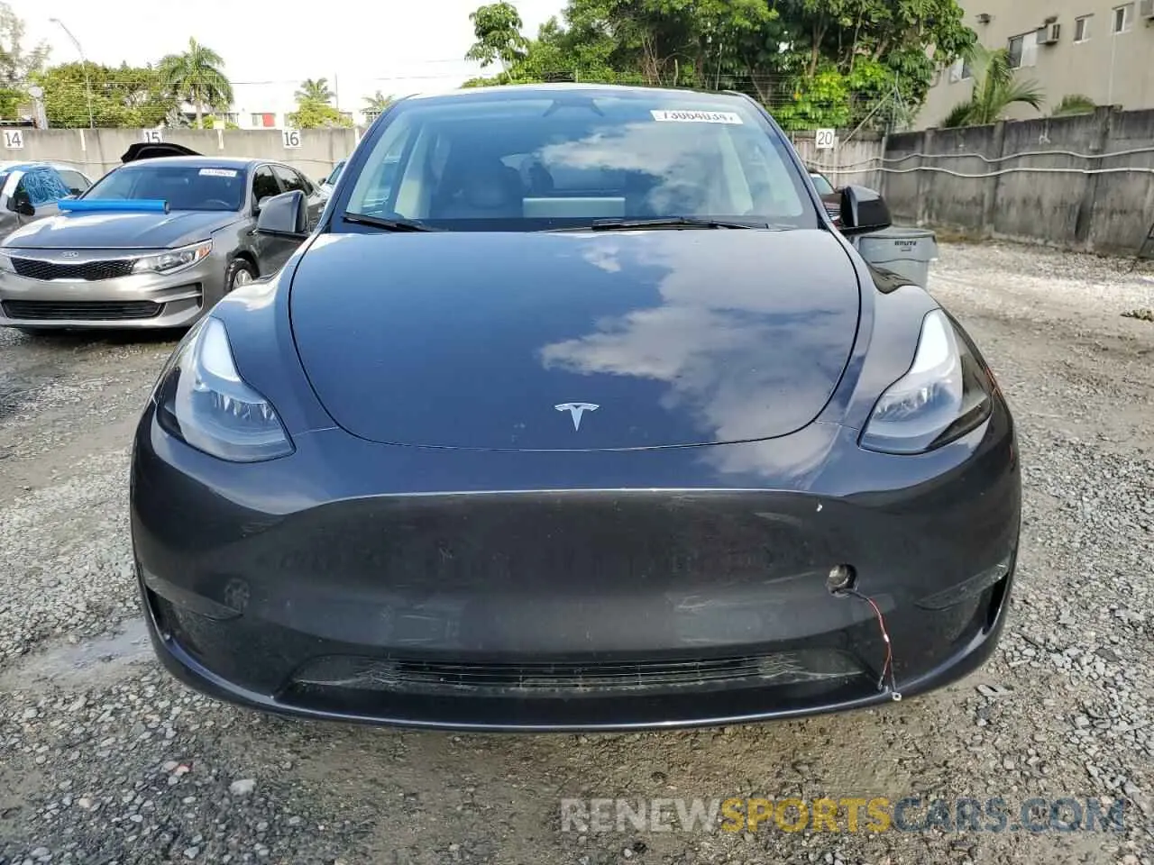 5 fotografías del automóvil dañado 7SAYGDED0RF093184 TESLA MODEL Y 2024