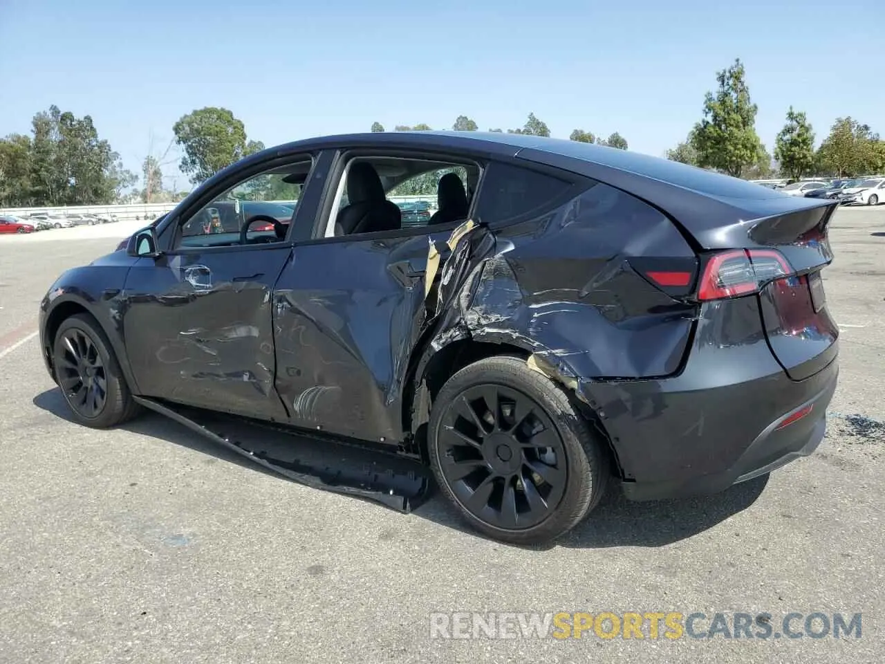2 fotografías del automóvil dañado 7SAYGDED0RF119721 TESLA MODEL Y 2024