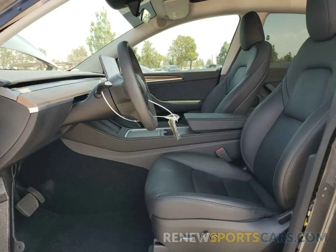 7 fotografías del automóvil dañado 7SAYGDED1RF046035 TESLA MODEL Y 2024
