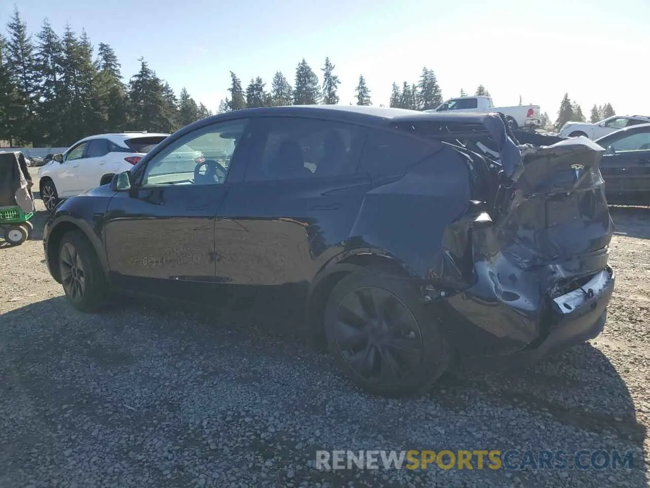 2 fotografías del automóvil dañado 7SAYGDED3RF151577 TESLA MODEL Y 2024