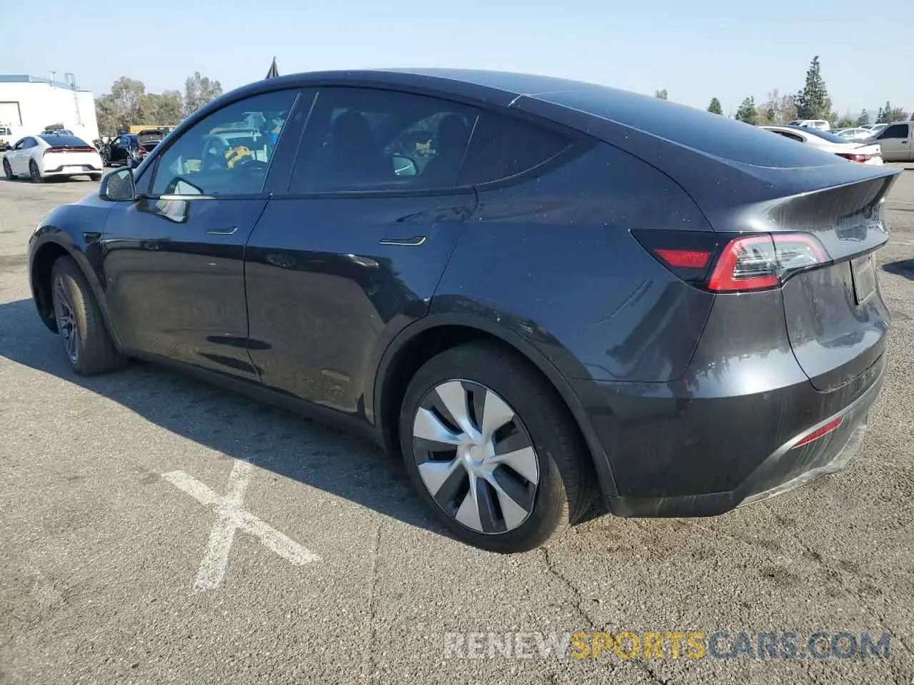 2 fotografías del automóvil dañado 7SAYGDED4RF032615 TESLA MODEL Y 2024