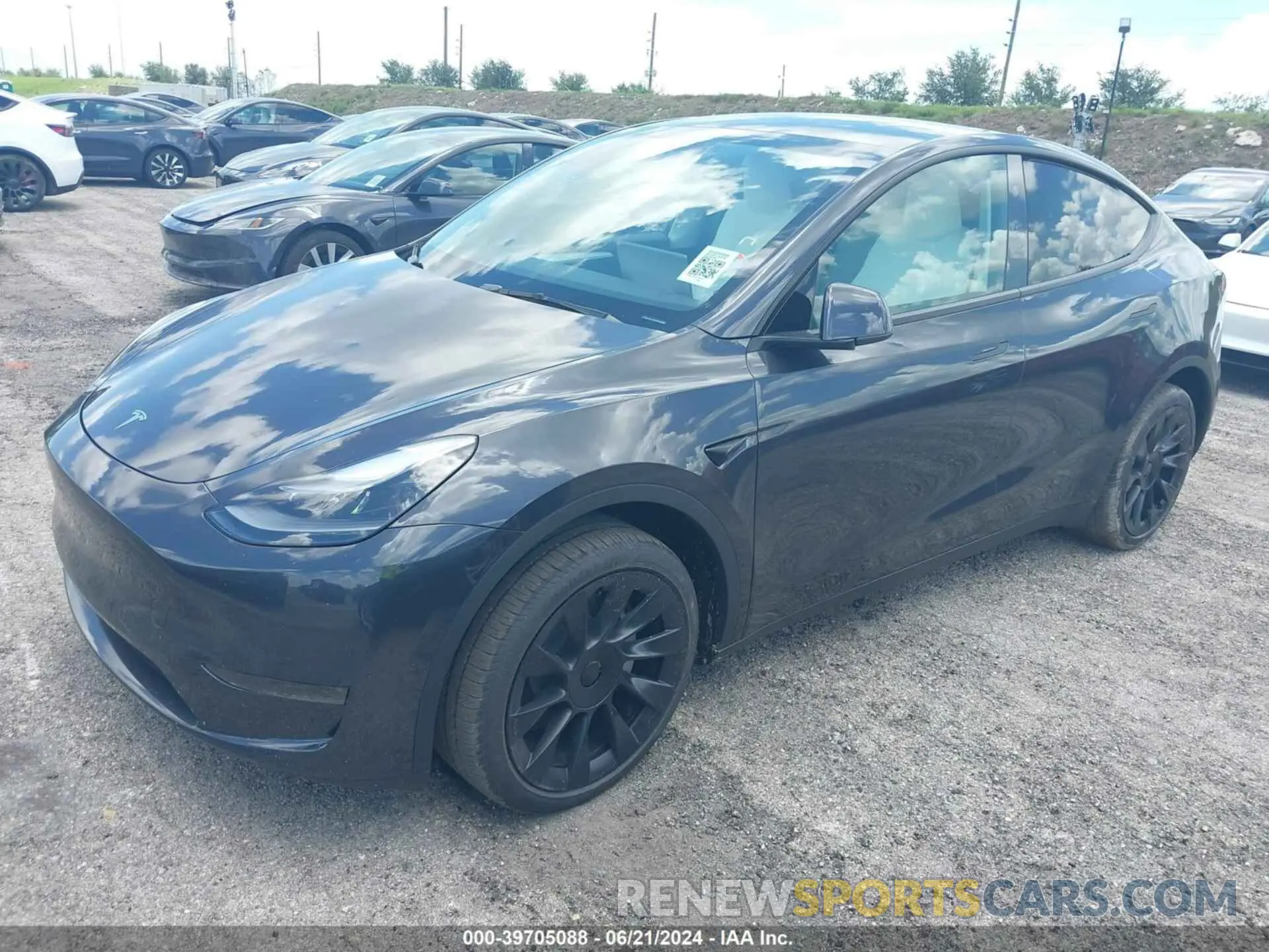 2 fotografías del automóvil dañado 7SAYGDED4RF098999 TESLA MODEL Y 2024