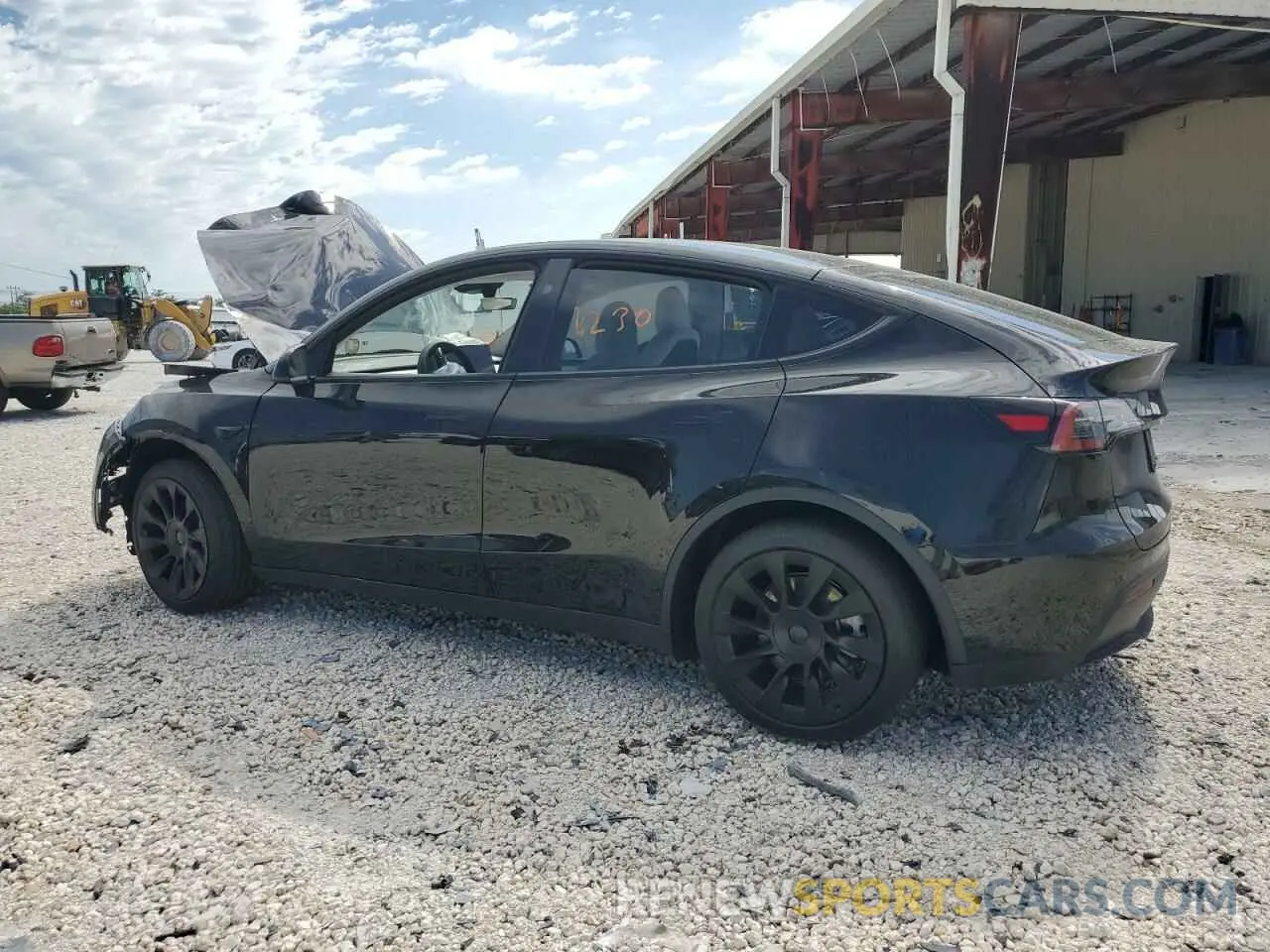 2 fotografías del automóvil dañado 7SAYGDED5RF009277 TESLA MODEL Y 2024