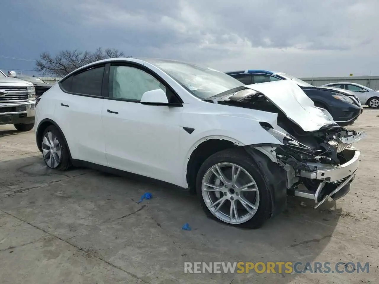4 fotografías del automóvil dañado 7SAYGDED5RF045017 TESLA MODEL Y 2024