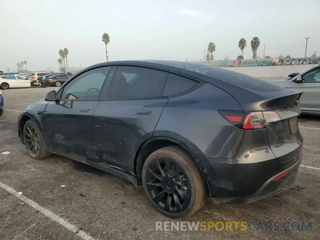 2 fotografías del automóvil dañado 7SAYGDED7RF103600 TESLA MODEL Y 2024