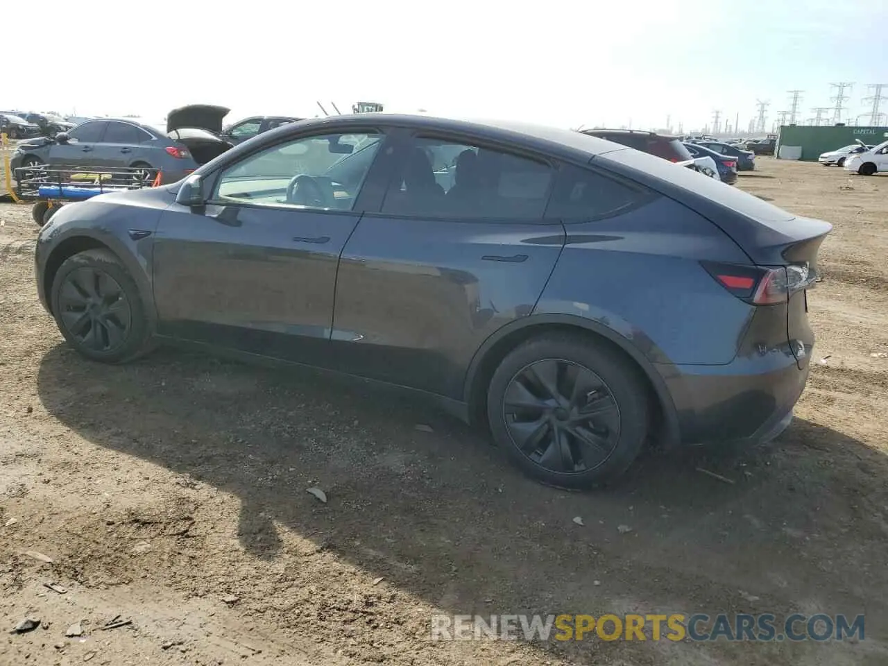 2 fotografías del automóvil dañado 7SAYGDED7RF163537 TESLA MODEL Y 2024