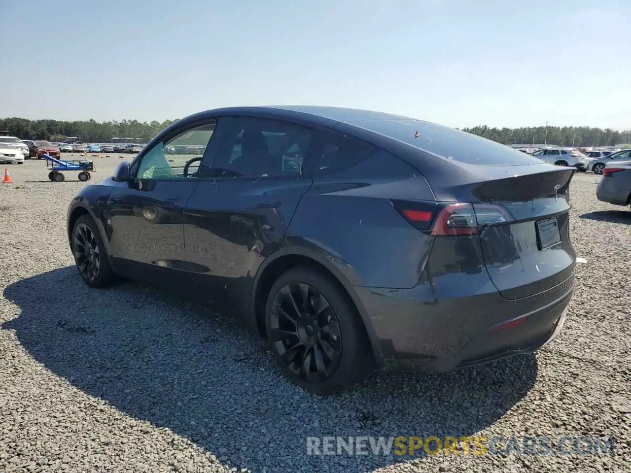 2 fotografías del automóvil dañado 7SAYGDED8RF091697 TESLA MODEL Y 2024