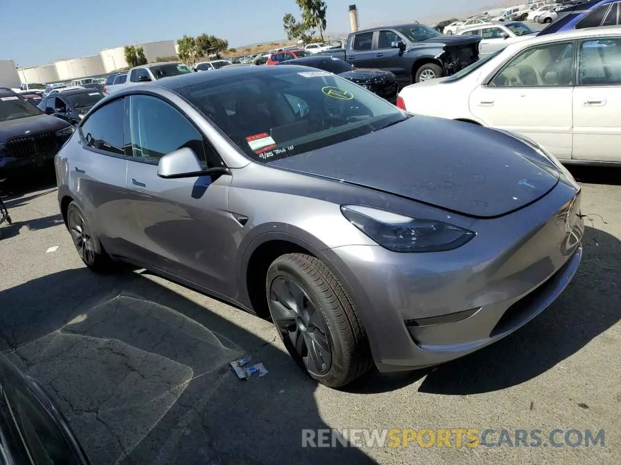 4 fotografías del automóvil dañado 7SAYGDED8RF195669 TESLA MODEL Y 2024