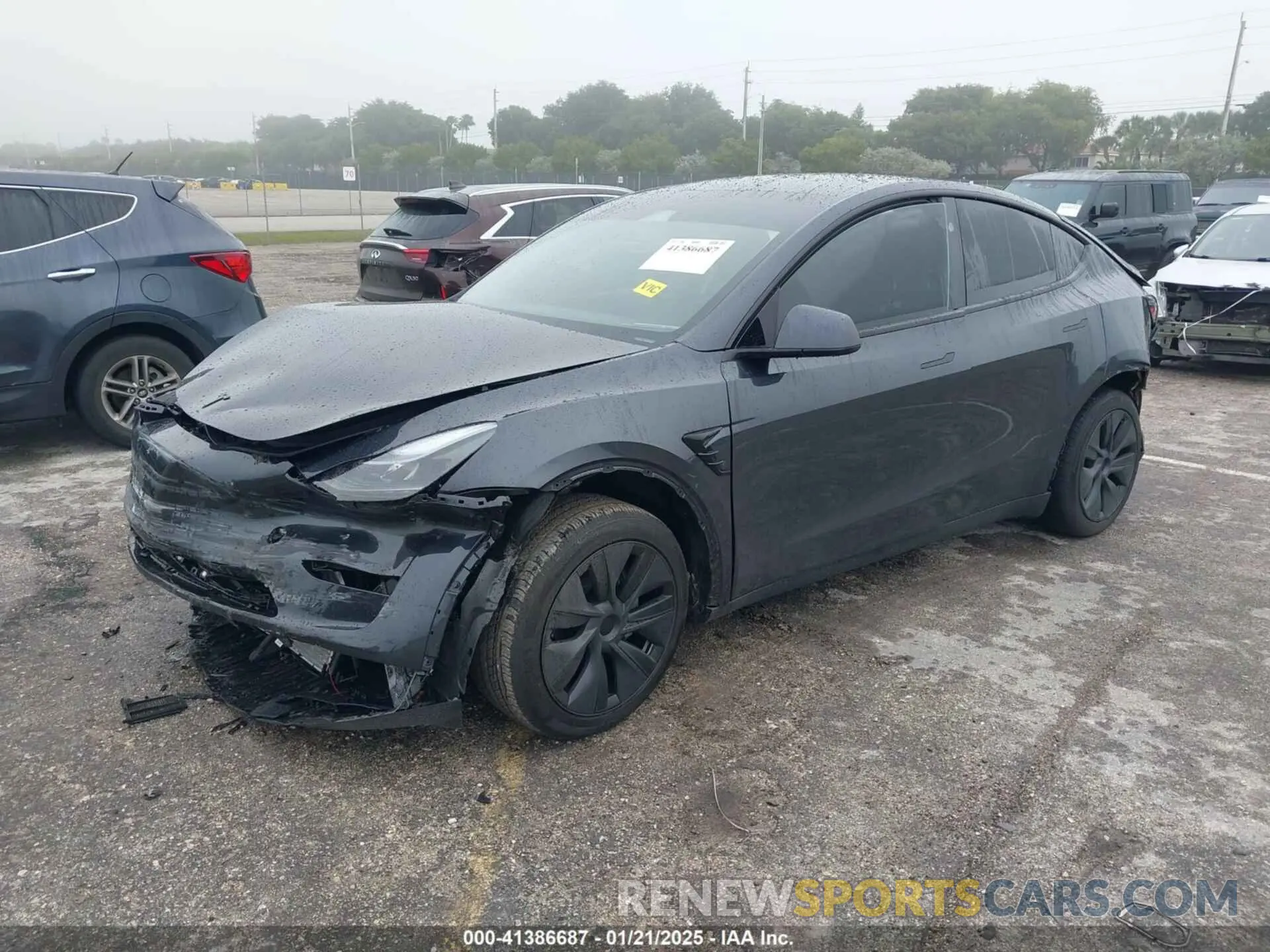 2 fotografías del automóvil dañado 7SAYGDED8RF213927 TESLA MODEL Y 2024