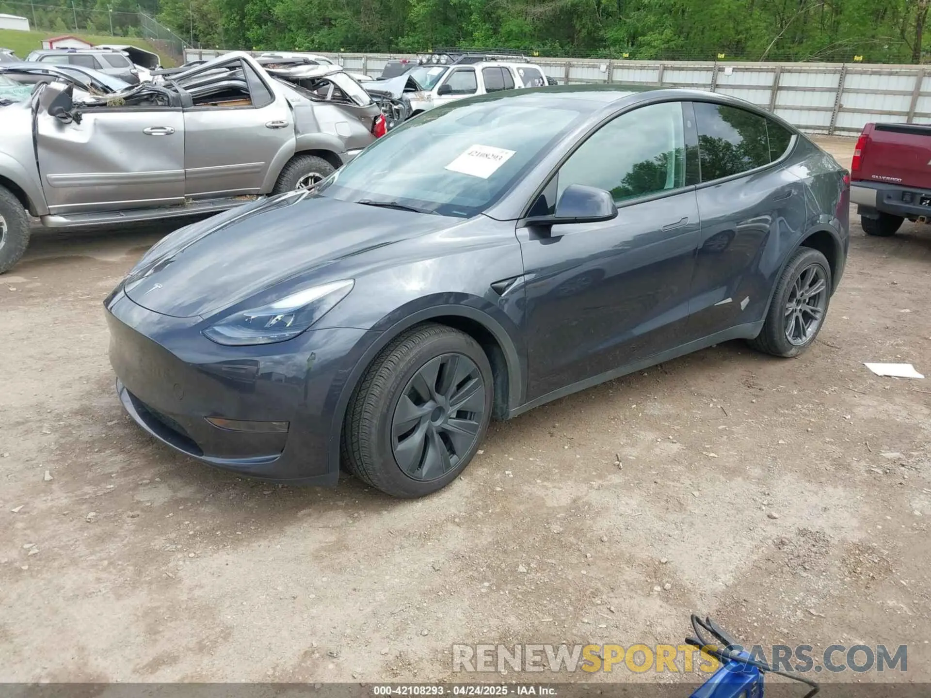 2 fotografías del automóvil dañado 7SAYGDED9RA323124 TESLA MODEL Y 2024