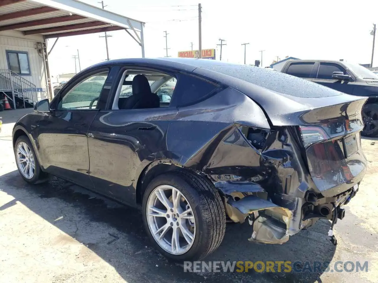 2 fotografías del automóvil dañado 7SAYGDEDXRF052447 TESLA MODEL Y 2024