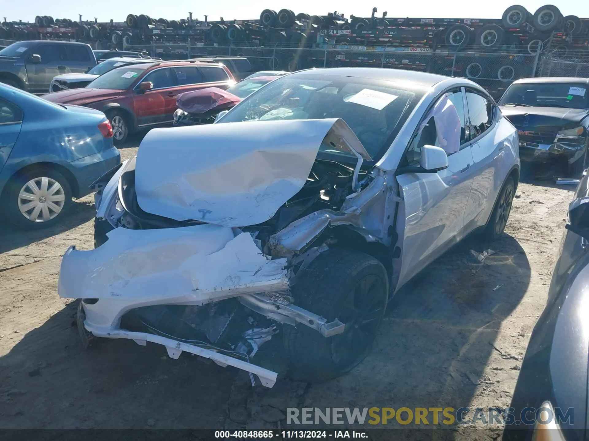 2 fotografías del automóvil dañado 7SAYGDEDXRF111707 TESLA MODEL Y 2024