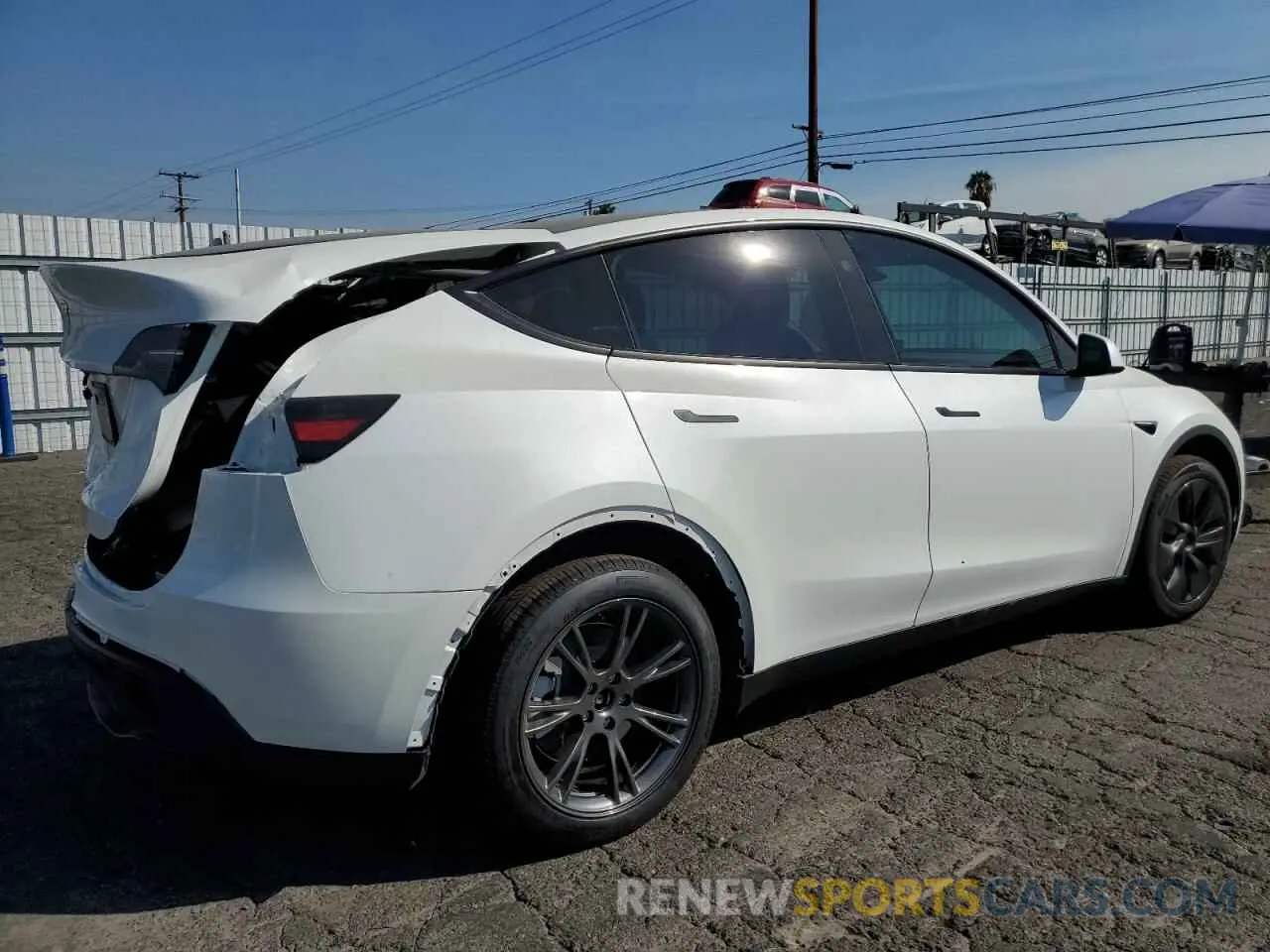 3 fotografías del automóvil dañado 7SAYGDEDXRF150412 TESLA MODEL Y 2024