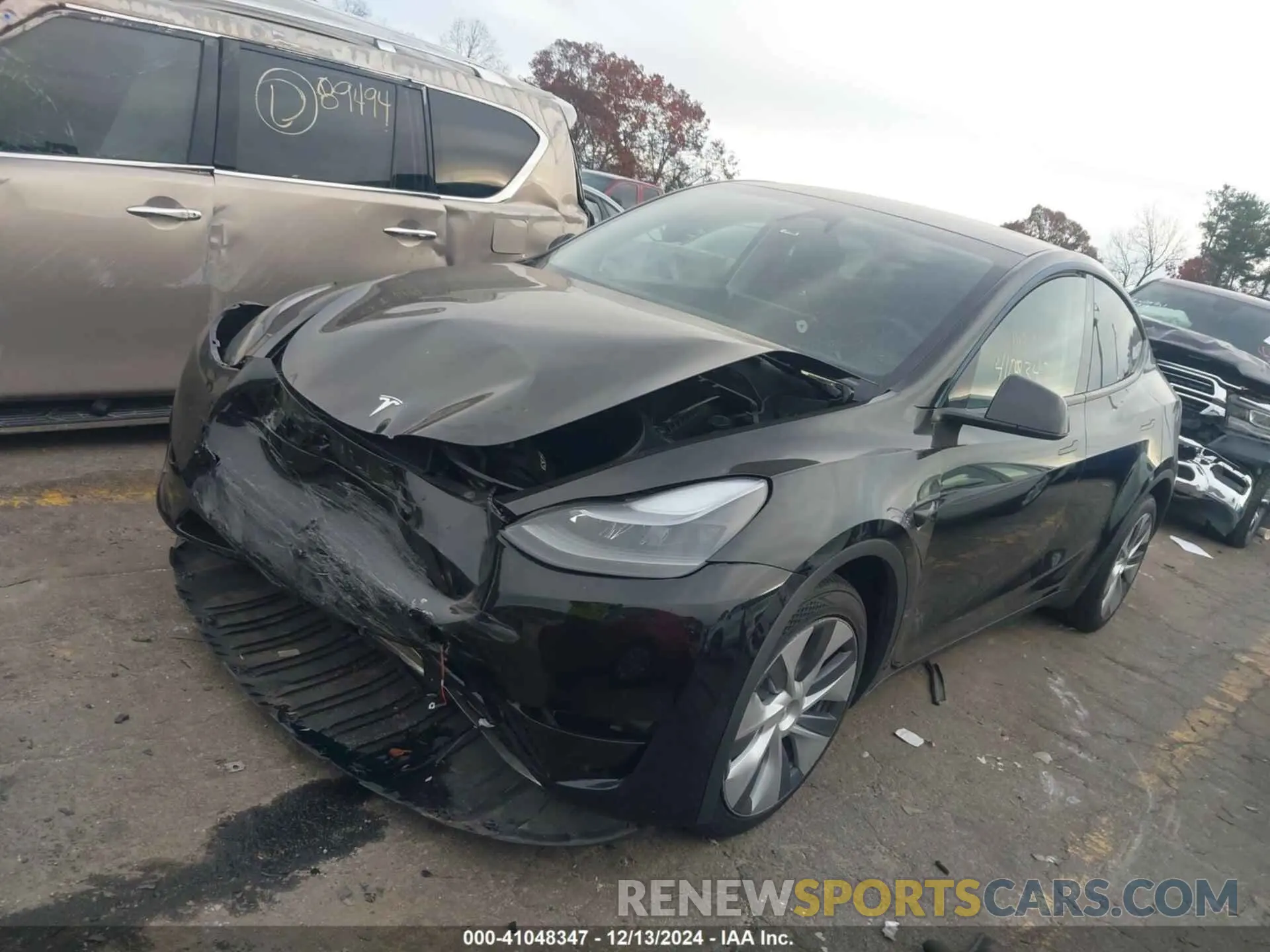 2 fotografías del automóvil dañado 7SAYGDEE1RA234673 TESLA MODEL Y 2024