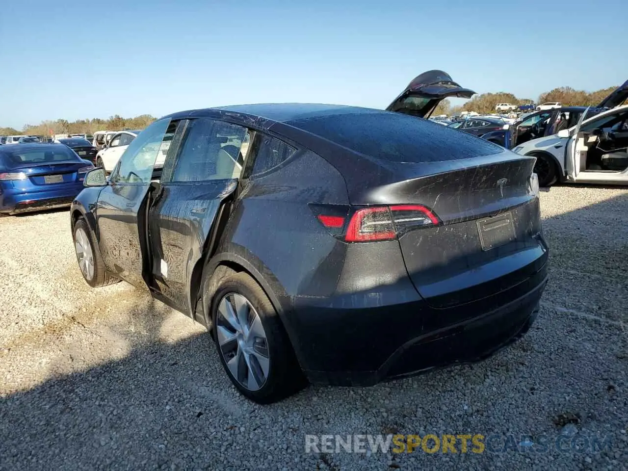 2 fotografías del automóvil dañado 7SAYGDEE1RA282917 TESLA MODEL Y 2024