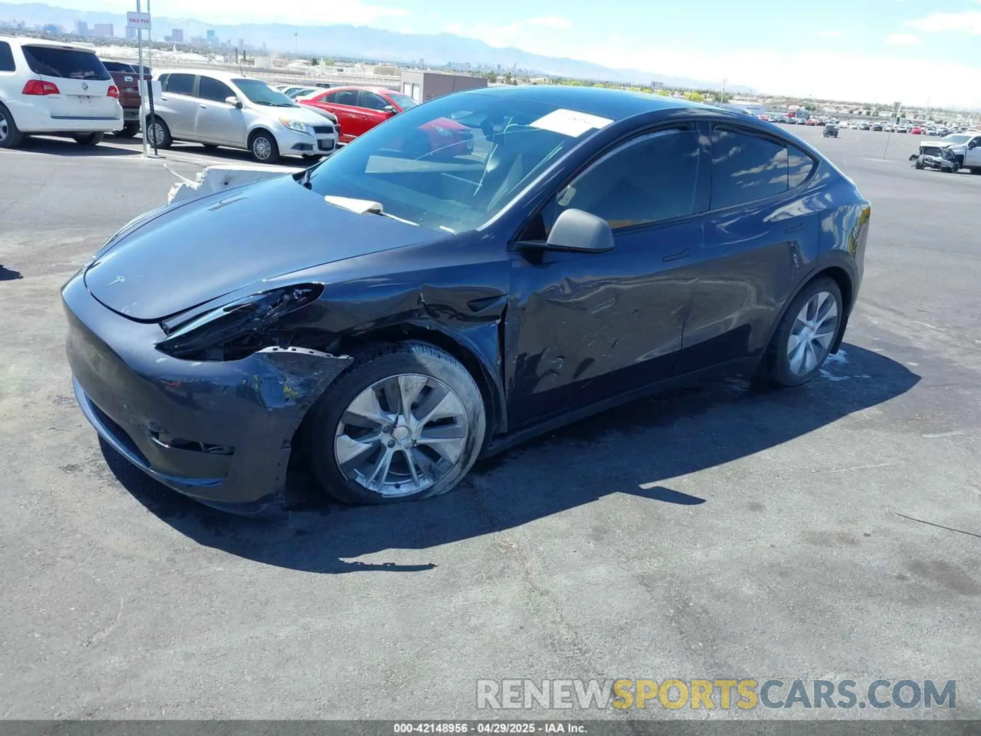 2 fotografías del automóvil dañado 7SAYGDEE2RA233855 TESLA MODEL Y 2024