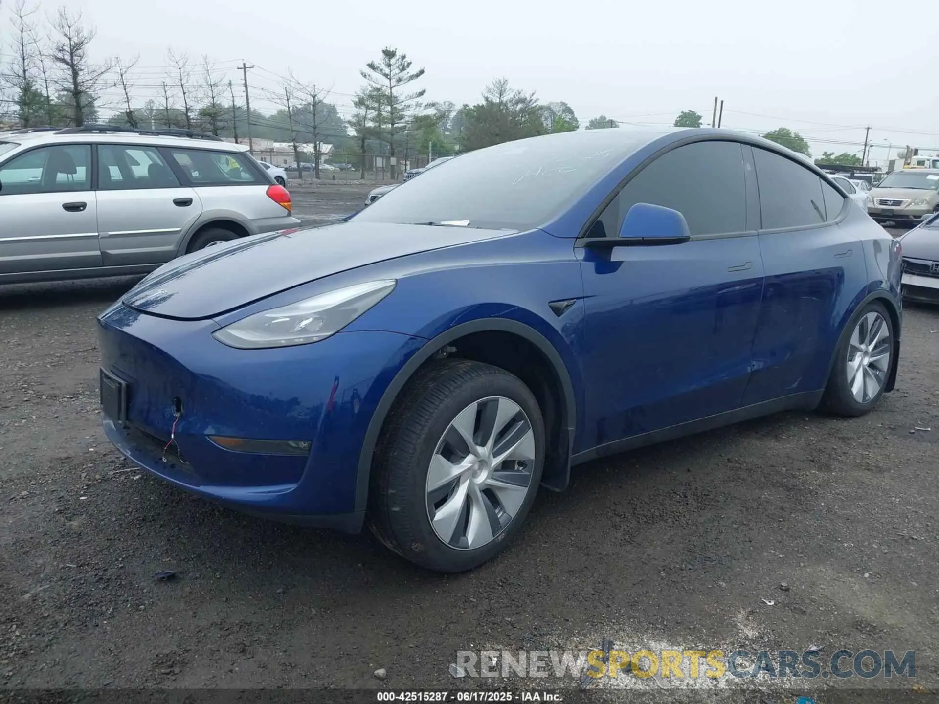 2 fotografías del automóvil dañado 7SAYGDEE2RA287463 TESLA MODEL Y 2024