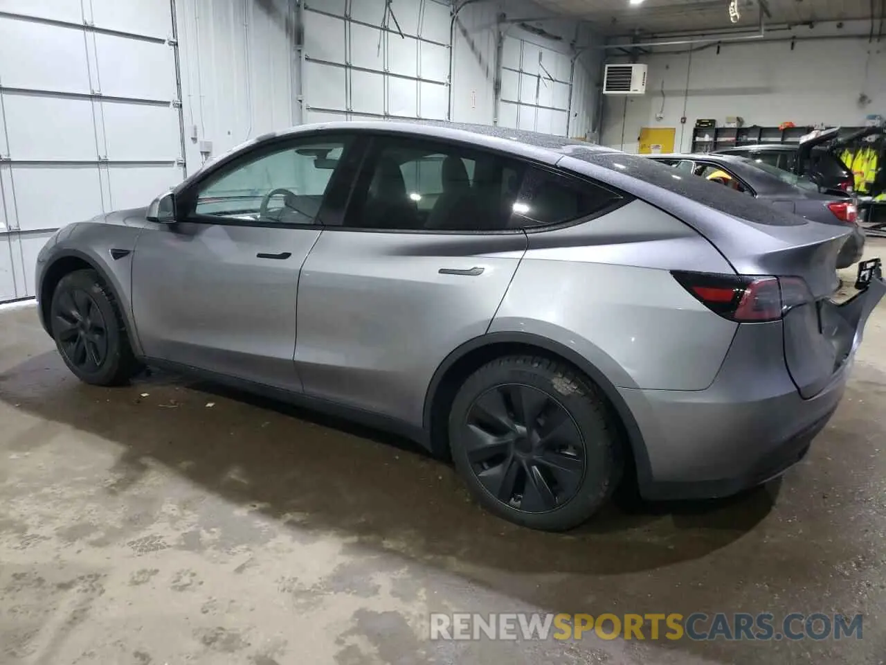 2 fotografías del automóvil dañado 7SAYGDEE3RA293367 TESLA MODEL Y 2024